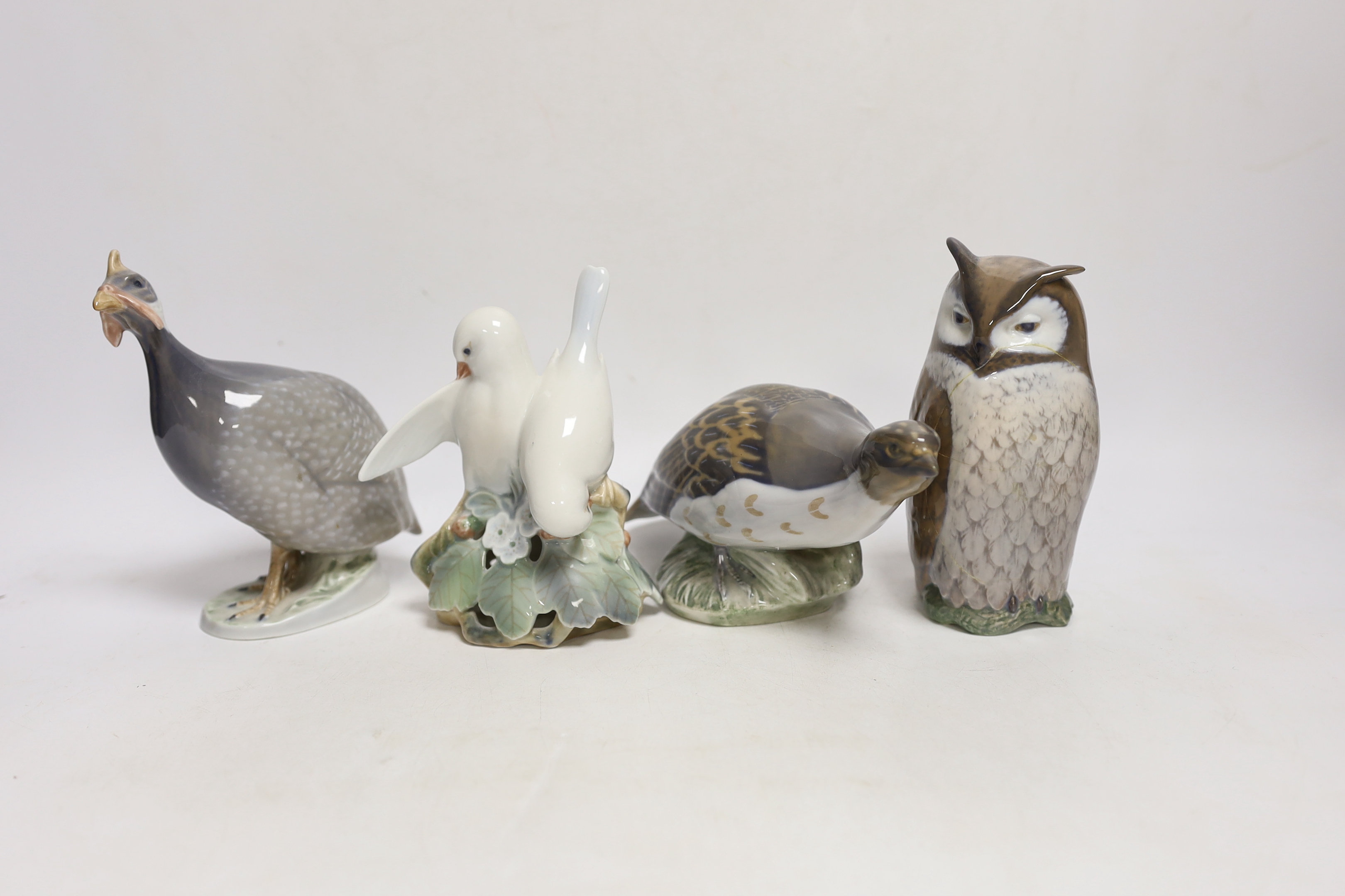 A six Royal Copenhagen birds including a swan and an owl, largest 17cm wide